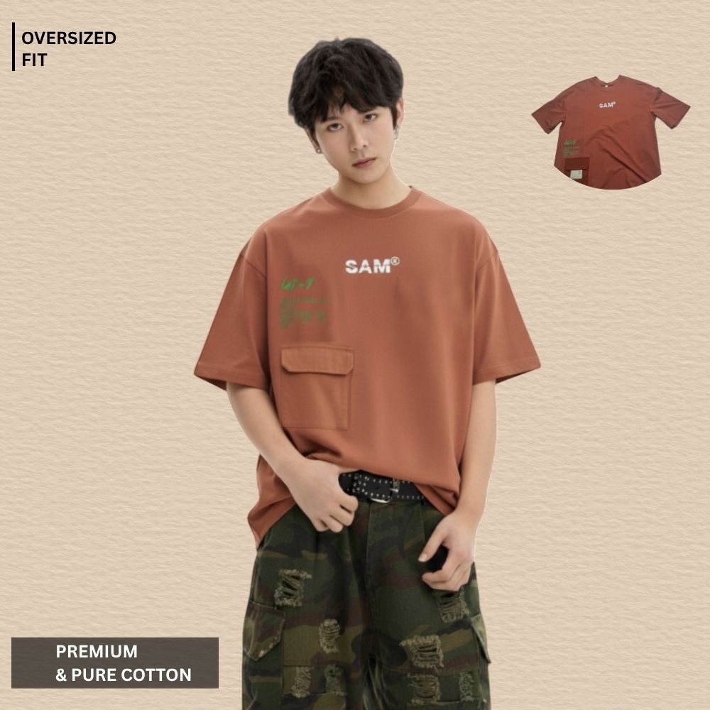 Brown Oversized Premium Cotton T-Shirt with Utility style chest pocket with a contrast fabric patch and graphic accentsPocket