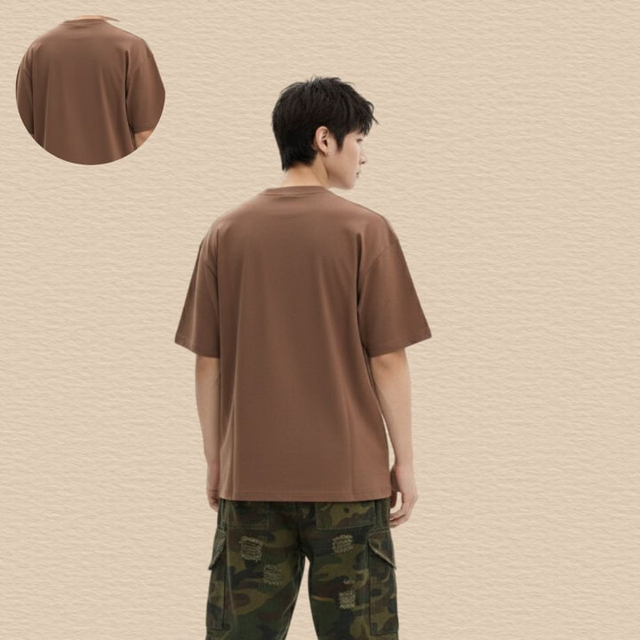 Brown Oversized Premium Cotton T-Shirt with Utility style chest pocket with a contrast fabric patch and graphic accentsPocket